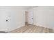 A simply designed bedroom features neutral walls and wood-look flooring at 1101 Oak Knoll Ter, Atlanta, GA 30315