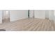 Spacious bedroom featuring light wood floors and multiple doorways at 1101 Oak Knoll Ter, Atlanta, GA 30315