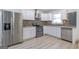Stylish kitchen with stainless steel appliances and white cabinets at 1101 Oak Knoll Ter, Atlanta, GA 30315