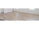 Spacious living room with wood-look floors and natural lighting at 1101 Oak Knoll Ter, Atlanta, GA 30315