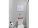 The half bathroom includes a stylish vanity, light gray walls, and lovely decorations at 100 Chantilly Ln, Fayetteville, GA 30215