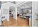 Elegant dining room with coffered ceiling, hardwood floors, and views to living areas at 100 Chantilly Ln, Fayetteville, GA 30215