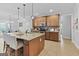 Gourmet kitchen featuring a granite island, stainless appliances, and custom cabinetry at 100 Chantilly Ln, Fayetteville, GA 30215
