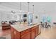 Open concept kitchen flowing into living room and dining area at 100 Chantilly Ln, Fayetteville, GA 30215