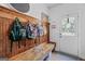 Mudroom with a built-in bench for organizing at 100 Chantilly Ln, Fayetteville, GA 30215