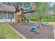 Backyard playground with multiple play structures, providing endless outdoor fun for  at 100 Chantilly Ln, Fayetteville, GA 30215