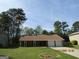 Charming single-story home with a well-maintained lawn and attached two-car garage at 1611 Cherry Hill Sw Ct, Conyers, GA 30094