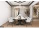 Elegant dining room with a modern light fixture, sleek table, and seating for ten at 2700 Antioch Ne St, Conyers, GA 30013