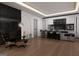 Modern living area with a sleek bar, comfortable seating, and hardwood floors at 2700 Antioch Ne St, Conyers, GA 30013