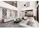 Bright and airy living room with high ceilings, modern furnishings, and abundant natural light at 2700 Antioch Ne St, Conyers, GA 30013