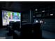 Home theater featuring comfortable seating, a large screen, and a stylish bar area for entertainment at 2700 Antioch Ne St, Conyers, GA 30013