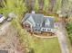 Aerial view of a two-story home, showcasing the roof and backyard at 240 Sturgess Run, Sharpsburg, GA 30277