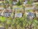 A view of the home from above, showcasing its lot and surrounding greenery at 240 Sturgess Run, Sharpsburg, GA 30277