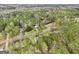 Distant aerial view of community, showing the home's location in a wooded area at 240 Sturgess Run, Sharpsburg, GA 30277