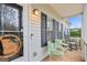 Charming front porch with seating, a view of the door, and a Ring doorbell at 240 Sturgess Run, Sharpsburg, GA 30277