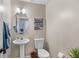 Cozy half bath at 240 Sturgess Run, Sharpsburg, GA 30277