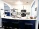 This stylish kitchen offers a breakfast bar with seating and stainless steel appliances at 3353 Medina Dr, Jonesboro, GA 30236