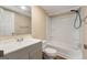 Neutral bathroom featuring a shower-tub combo and a modern vanity at 351 Hemlock Ln, Locust Grove, GA 30248