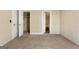 Bedroom featuring neutral walls and carpet with a closet and ensuite bathroom at 351 Hemlock Ln, Locust Grove, GA 30248