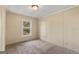 Bedroom featuring neutral walls and carpet with a window to the outside at 351 Hemlock Ln, Locust Grove, GA 30248