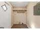 Spacious laundry room with storage shelves and convenient washer/dryer hookups at 351 Hemlock Ln, Locust Grove, GA 30248
