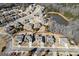 Aerial view of homes in a neighborhood with a small lake and cul-de-sacs at 409 Brandy Ln, Mcdonough, GA 30253