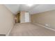 Finished attic featuring neutral carpet, paint, baseboards and access door at 409 Brandy Ln, Mcdonough, GA 30253