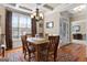 Dining room with coffered ceilings and entry view to the front door at 409 Brandy Ln, Mcdonough, GA 30253