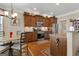 Stylish kitchen with stainless steel appliances, granite countertops, and custom cabinetry at 409 Brandy Ln, Mcdonough, GA 30253