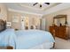Tranquil main bedroom with neutral tones and a spacious layout at 409 Brandy Ln, Mcdonough, GA 30253