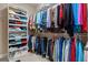 Spacious walk-in closet with ample shelving and hanging storage for clothes and accessories at 409 Brandy Ln, Mcdonough, GA 30253