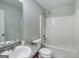 Bathroom with modern sink, toilet and shower/tub combination at 540 Hamlet Dr, Hampton, GA 30228