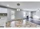 Open-concept living space features an eat-in kitchen and plenty of natural light at 540 Hamlet Dr, Hampton, GA 30228