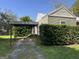 Charming single-story home featuring a covered parking area and mature landscaping at 4941 Old Atlanta Rd, Hampton, GA 30228