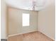 Empty bedroom with carpet, ceiling fan, and a bright window at 1103 Larkspur Dr, Locust Grove, GA 30248