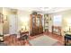 Cozy living space with hardwood floors, a small rug, and charming decor at 1103 Larkspur Dr, Locust Grove, GA 30248