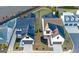 A high aerial view shows two modern farmhouse-style homes with neat landscaping and dark accents at 1230 Hayes Sq, Peachtree City, GA 30269