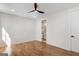 Bedroom with hardwood floors and ceiling fan offers a comfortable and inviting space at 1230 Hayes Sq, Peachtree City, GA 30269