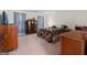 Comfortable bedroom featuring neutral colors, a bed, and a wardrobe at 575 Chuli Rd, Locust Grove, GA 30248