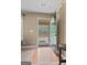 Inviting entryway featuring hardwood floors, a welcoming front door view, and neutral wall colors at 575 Chuli Rd, Locust Grove, GA 30248