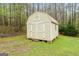 Large storage shed with double doors and a window at 575 Chuli Rd, Locust Grove, GA 30248