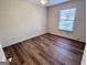 Bedroom with hardwood floors, natural light, and ceiling fan at 116 Glendale Dr, Peachtree City, GA 30269