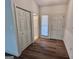 Welcoming foyer with hardwood floors and ample closet space, perfect for organization and storage at 116 Glendale Dr, Peachtree City, GA 30269