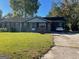 Charming one-story brick home with a covered carport and a well-maintained front yard at 266 Ridge Trl, Riverdale, GA 30274