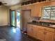 This home features natural wood cabinets and a sliding glass door leading to the outside at 266 Ridge Trl, Riverdale, GA 30274
