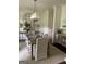 Elegant dining room with modern chandelier, stylish rug, and complementary decor creating an inviting atmosphere at 813 Creekgarden Court, Atlanta, GA 30339