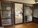 Cozy screened porch with sliding glass doors, offering views of the outdoors at 6099 Winview Dr, Forest Park, GA 30297