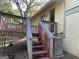 Backyard steps that lead up to a wooden deck; great for outdoor entertaining at 6332 Valley Dale Dr, Riverdale, GA 30274