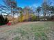 Expansive backyard featuring lush greenery and mature trees, offering privacy at 117 Old Stagecoach Rd, Carrollton, GA 30116