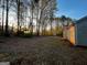 Large backyard featuring an additional storage shed at 117 Old Stagecoach Rd, Carrollton, GA 30116
